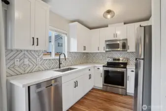 Trendy kitchen with stainless appliances