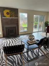 Great room design offers easy access to dining, back patio and kitchen