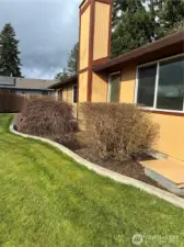 Cement curbs, patio and sidewalks line the home's perimeter. Easy care lawn edging.