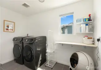 Laundry is upstairs on the south side of the house,