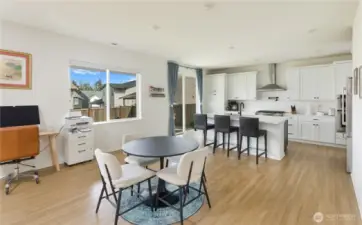 Kitchen, dining area, and slider leading to the back yard.