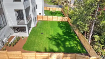 Huge and level backyard offers countless possibilities!
