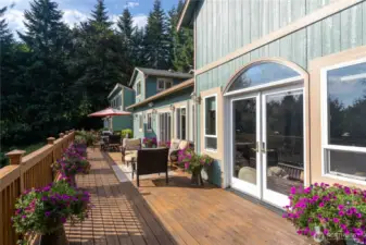 Main house 14 x 52 freshly stained cedar deck.
