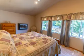 Another view of the primary bedroom looking out towards the vegetable garden.