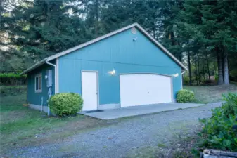 24 x 32 detached garage/shop, finished inside with propane heater.