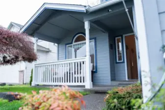 Enjoy conversations on the covered front porch