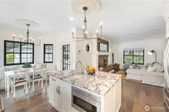 Beautifully updated kitchen with eating nook, pull out drawers, lots of cabinets, stainless appliances