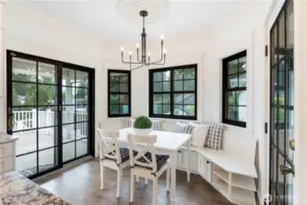 New Anderson windows installed throughout the house 5 years ago.  Casual eating area with slider to covered outdoor entertaining and views