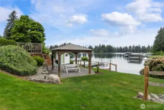Level waterfrontage with gazebo, outbuilding, easy access to the lake