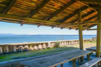 Covered dining area at one of the 3 private beaches in the Camano Country Club.