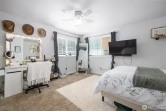 Upstairs bedroom #2 has lots of space and corner windows.