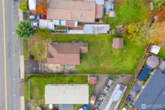 Huge backyard is level, fully fenced and surprisingly private!