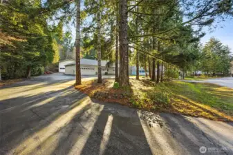 Circular driveway makes access to the home and shop easy.
