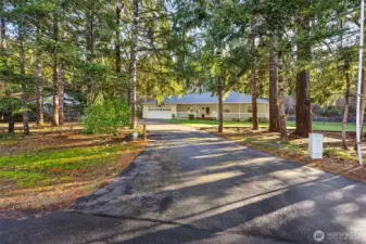 Set just off the road in this quiet and desirable neighborhood