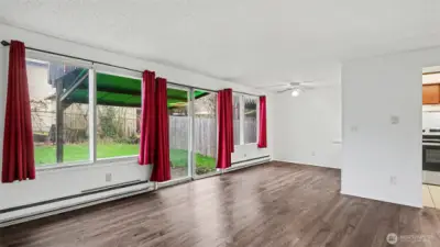 Living rm leads to patio & yard