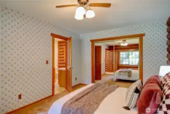 Primary bedroom looking into primary bathroom.