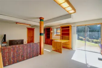 Basement looking toward sliding door to patio.