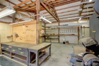 Looking north from the south-facing bay door side of shop interior.