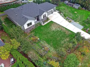 Aerial view looking SW at the property.  Nicely landscaped and ready to enjoy.