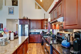The gourmet kitchen has stainless appliances and is a chef's dream.
