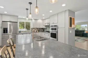 Gorgeous unique custom countertops really give this kitchen character!