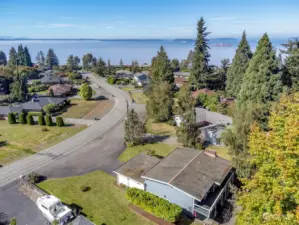 Desirable location, convenient to several amenities, and some view of Puget Sound.