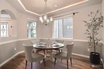 Dining Room with pan ceiling. Virtually Staged.