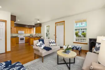 Open plan with large pantry to left behind the white door.