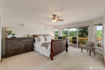 Wake up every morning to a view of calm waters from your spacious primary bedroom—your private retreat at the end of a long day.