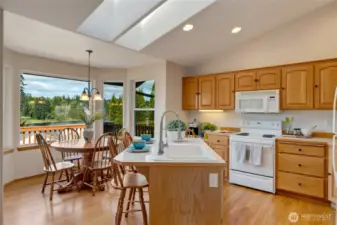 Skylights overhead fill the room with natural light, creating a bright and airy feel throughout the day.