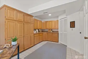 Lower level 4th bedroom / office with custom built in cabinetr