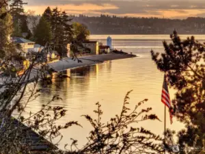 From your perch at 7314 Eastside Drive NE, gaze out over Caledonia Cove to the iconic Browns Point Lighthouse—a working beacon with deep maritime roots and timeless allure. Just a few blocks down the hill, the historic Lighthouse Keepers Cottage offers a rare gift: a romantic, rentable guest stay right in your own neighborhood. Whether hosting out-of-town visitors or planning a special celebration, this nearby inn adds flexibility and charm to life in the Cove. As the light turns golden and the flag stirs in the breeze, the setting becomes both postcard and possibility—steeped in history, steeped in heart.