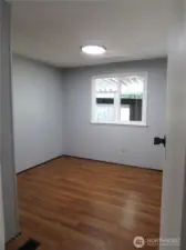 SPARE BEDROOM WINDOW OVERLOOKS COVED AREA IN FRONT OF HOME.
