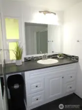 REMODELED BATHROOM GIVES MODERN FEEL, HAS A WALK-IN SHOWER.