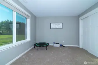 Spacious bedroom with views of front of property