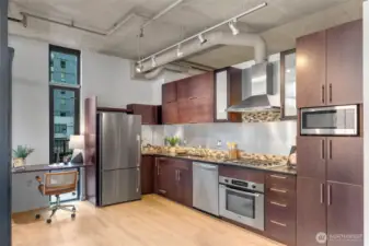 A perfect kitchen. Quality wood cabinets.
