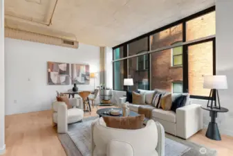 This is loft life. Custom roll shades for privacy.