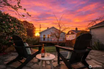 Sunset on Seattle's West side. The stone patio is set up for light, privacy and Sunset views.