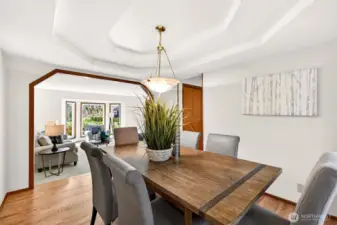 Dining room positioned for smooth flow between kitchen and living areas, creating a natural hub for entertaining.