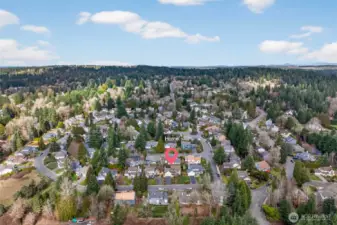 Neighborhood aerial view placing the home within the Olde Morrison Place area on English Hill, surrounded by established homes and greenery. A convenient Redmond location with quick access to everyday amenities and commuting routes.