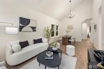 living room shares the entry and dining room