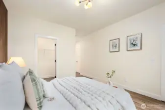 huge walk in closet with shelving