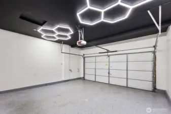 epoxy flooring, updated lighting new paint, EV Charger