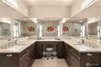Dual sinks + vanity provide plenty of space to get ready in the morning