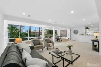 Spacious family room with gas fireplace & wet bar