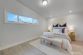 Private Primary bedroom, cathedral ceilings, USB ports on both sides of bed.