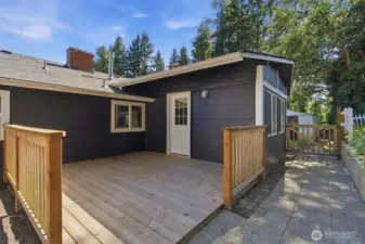 Spacious back deck. Door from dining area.