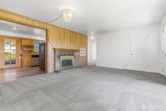 Living room view into kitchen.