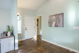 Entry with door leading to bonus room