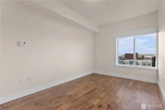 Large bedroom suite with view window & auto blinds